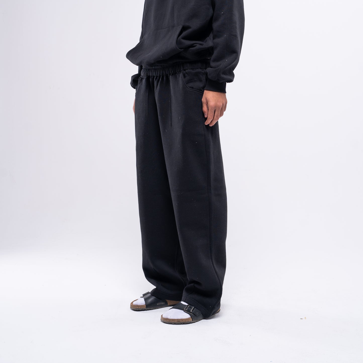 Semi-striped black sweatpants