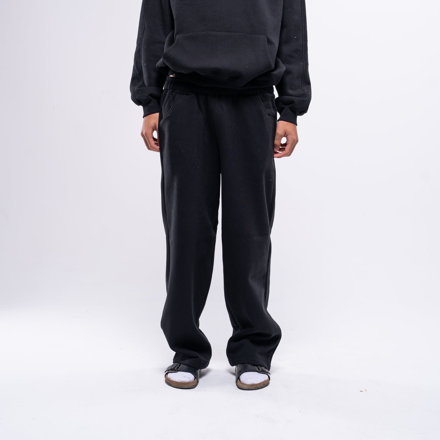 Semi-striped black sweatpants